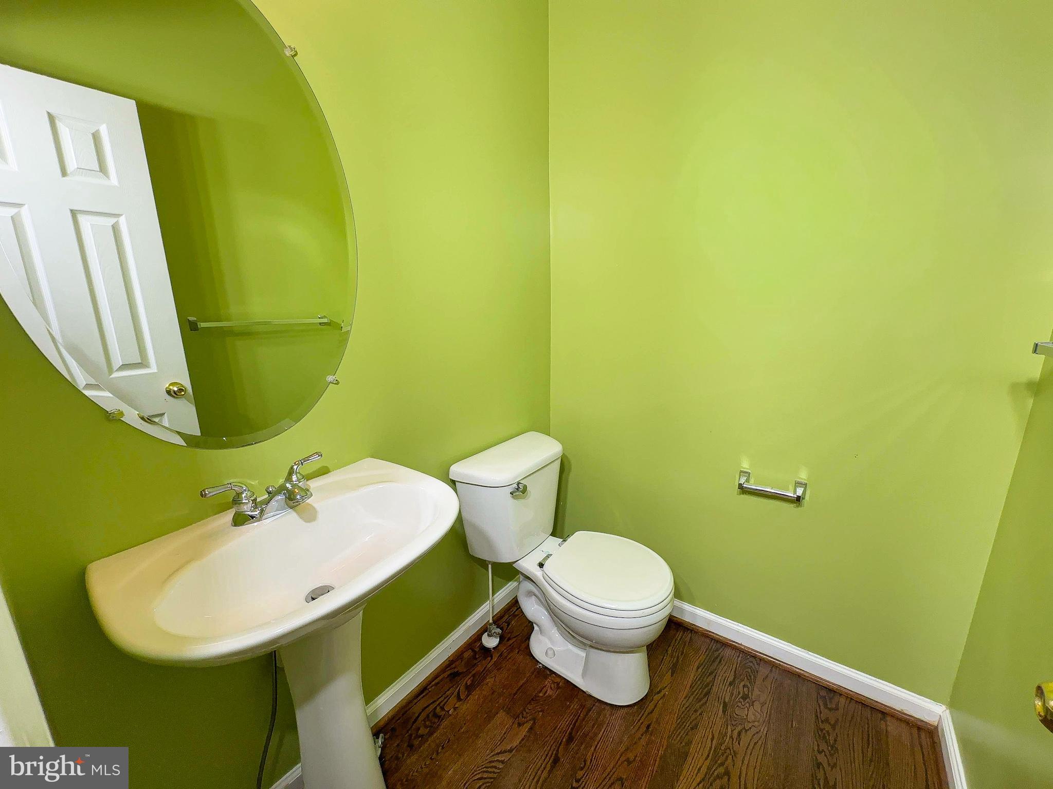 826 Lowe Road Baltimore, MD 21220 - Photo 21 of 35 a bathroom with a sink and a mirror