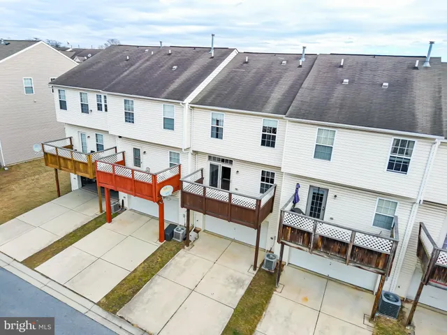 a roof view of a house with a sitting area