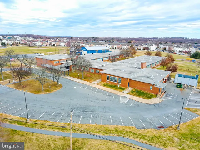 a view of a swimming pool with an ocean view