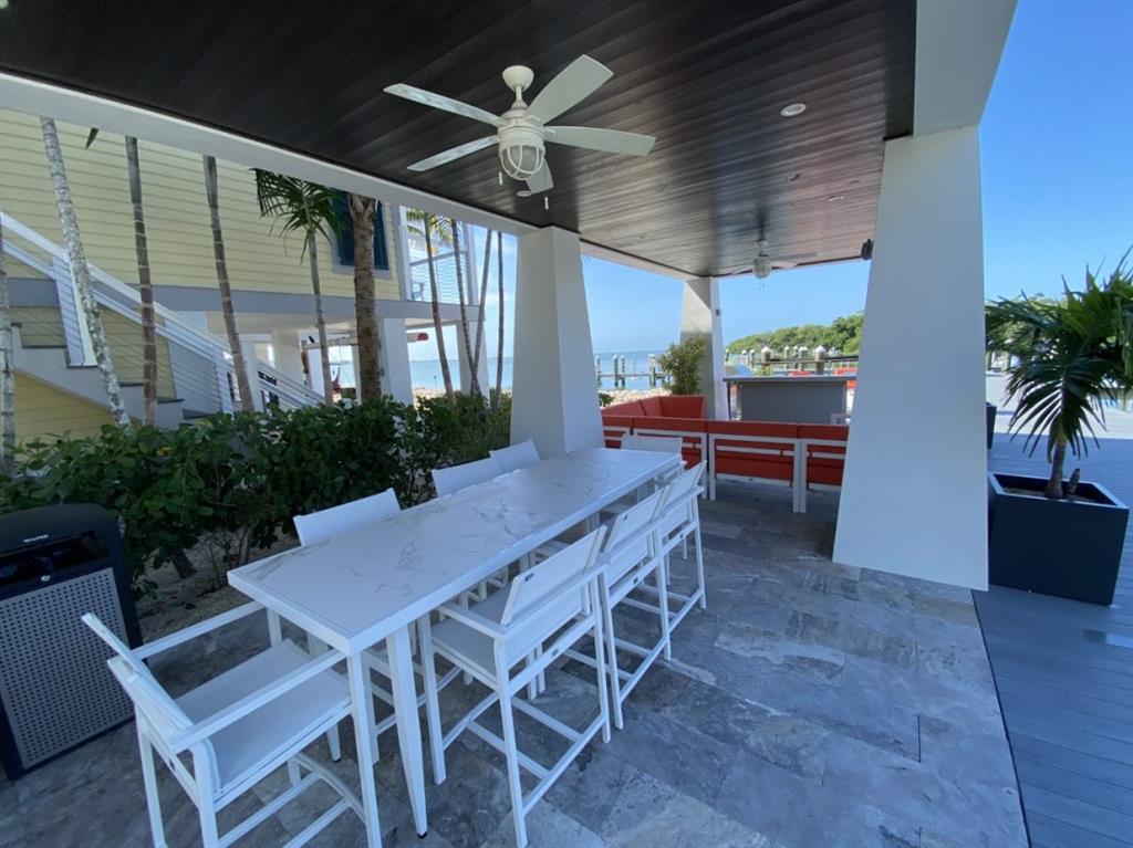 101 11th Street Marathon, FL 33051 - Photo 24 of 27 a view of an outside dining space with furniture