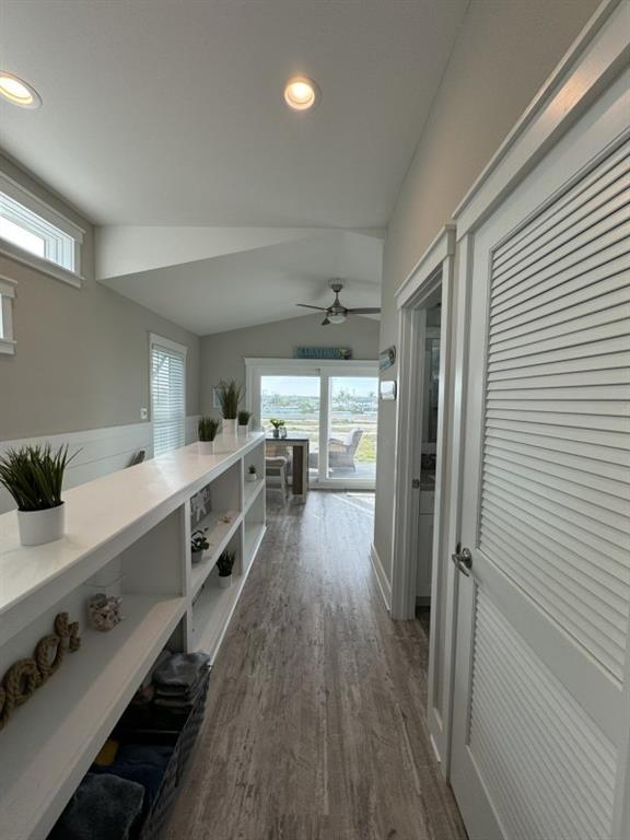 101 11th Street Marathon, FL 33051 - Photo 4 of 27 a large white kitchen with a large window a sink and stainless steel appliances