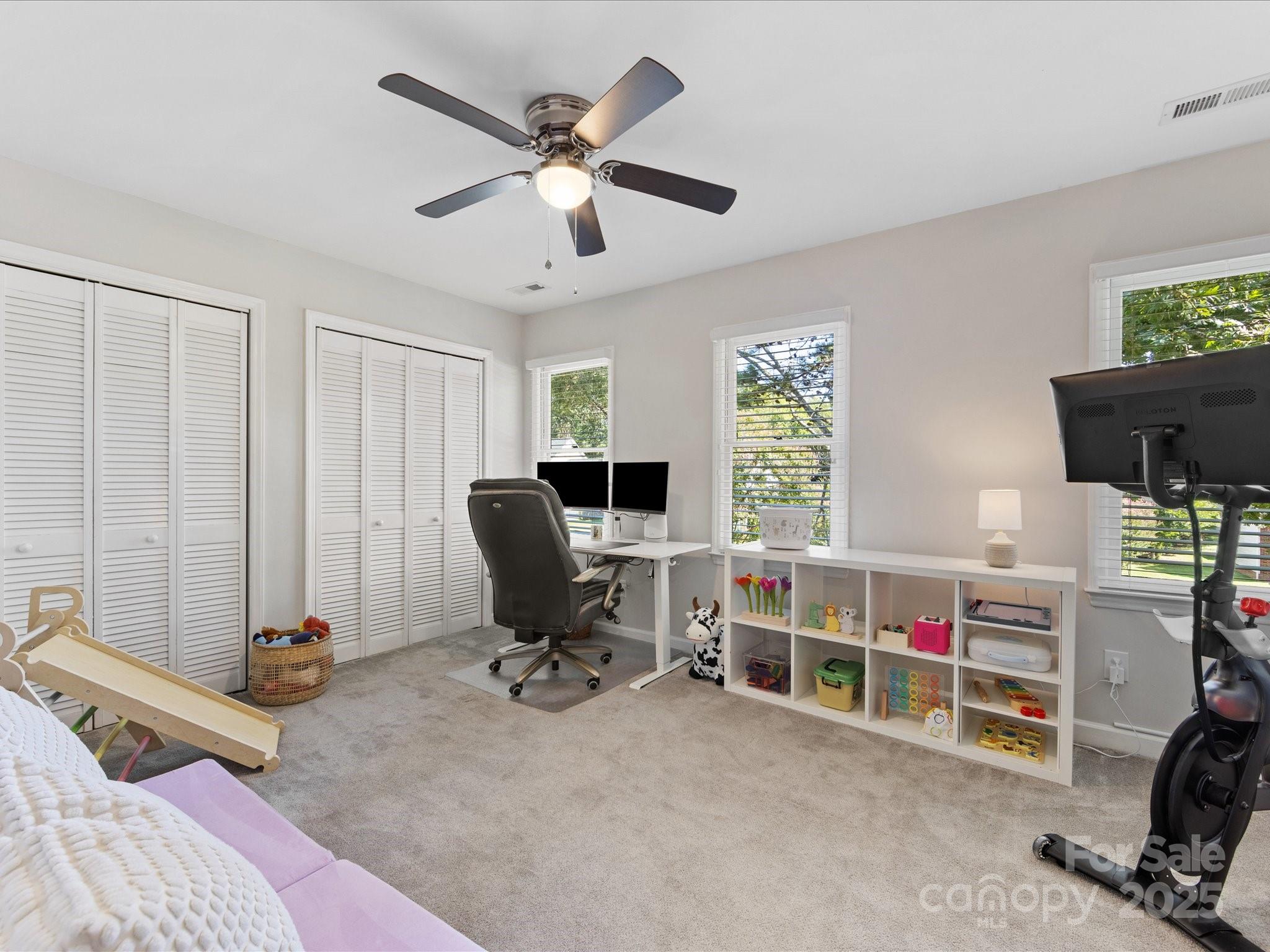 19607 Tryon Street Cornelius, NC 28031 - Photo 28 of 40 a view of a livingroom with workspace and a window