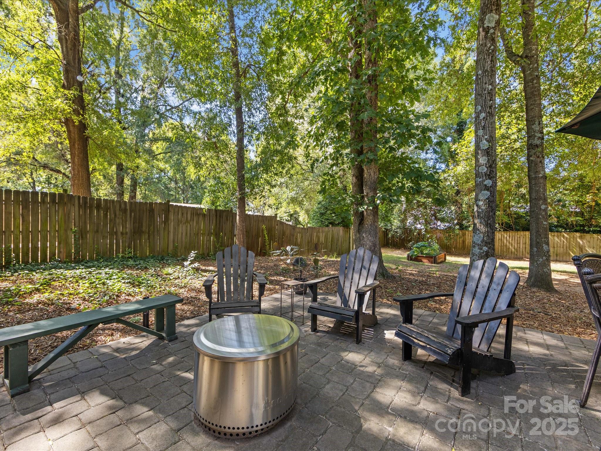19607 Tryon Street Cornelius, NC 28031 - Photo 34 of 40 a patio with patio a couch and chairs