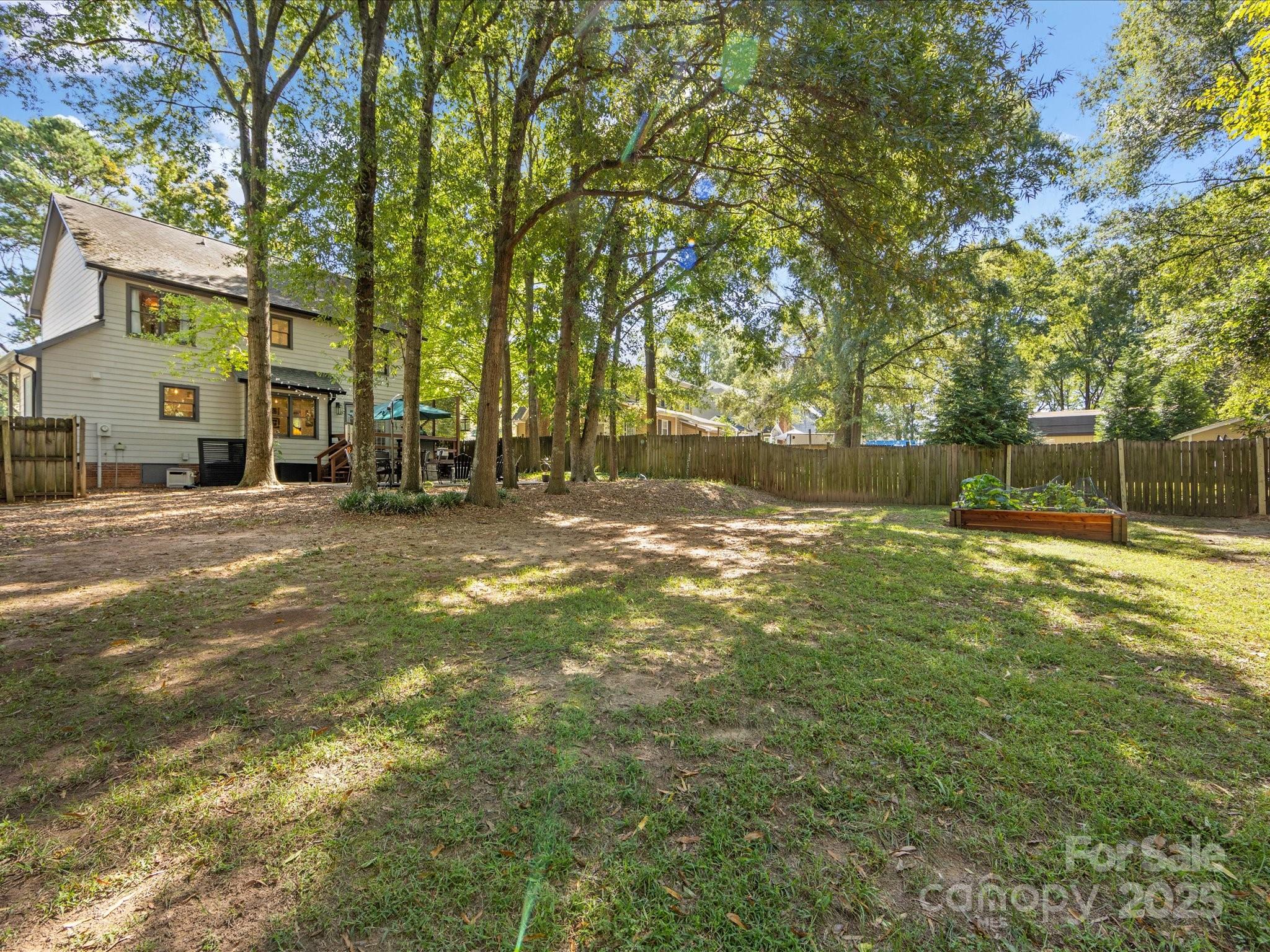 19607 Tryon Street Cornelius, NC 28031 - Photo 39 of 40 a view of a house with a yard