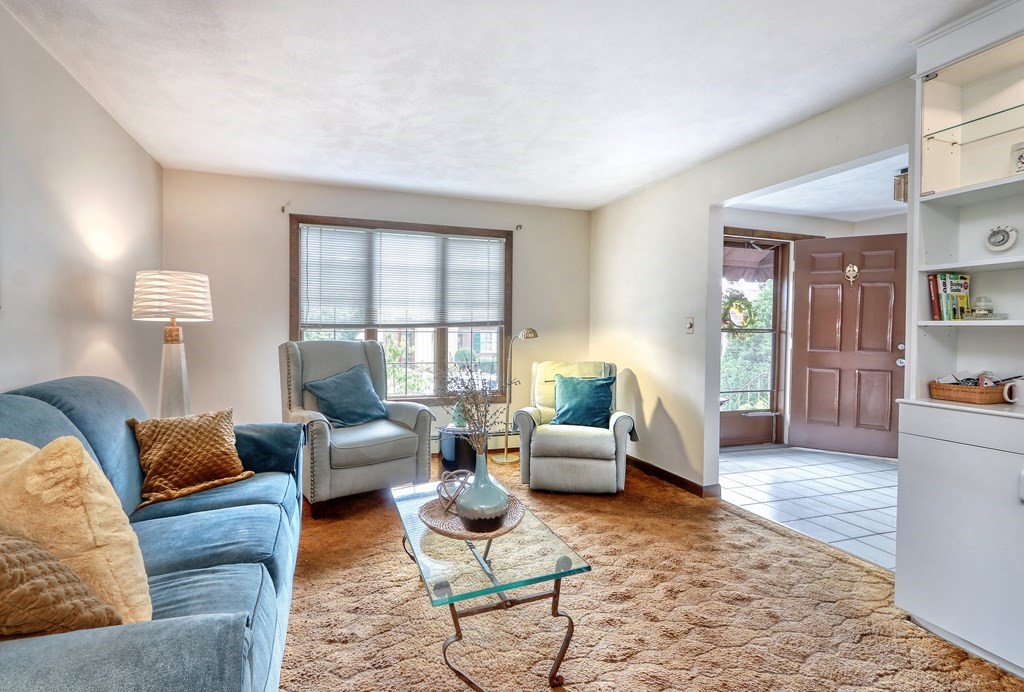 16 Welgate Road Medford, MA 02155 - Photo 2 of 38 a living room with furniture and a large window