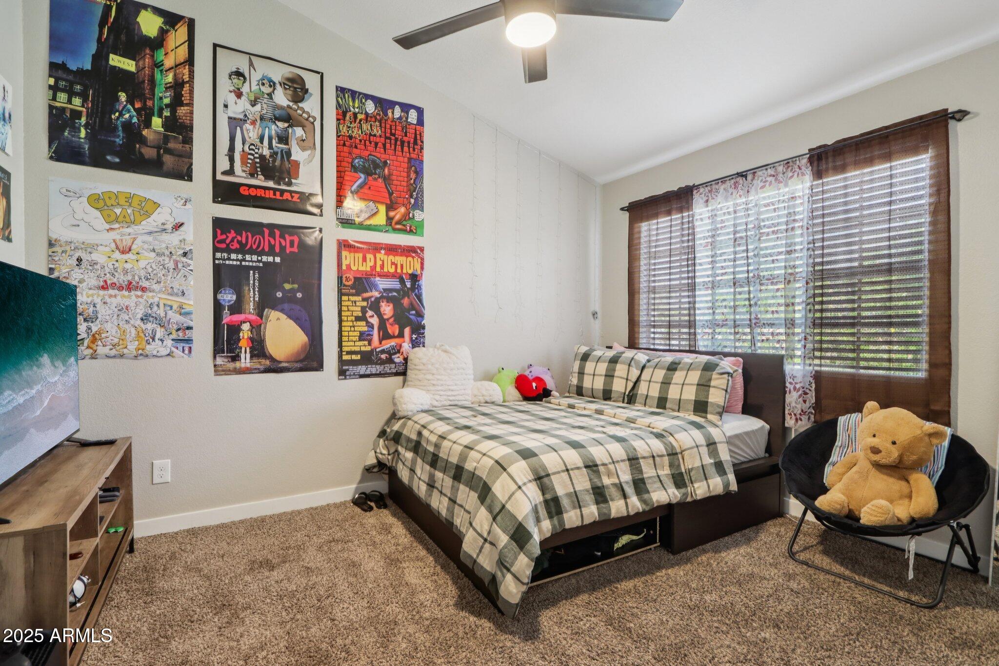510 North Alma School Road, Unit 174 Mesa, AZ 85201 - Photo 21 of 38 a bedroom with a bed and a window
