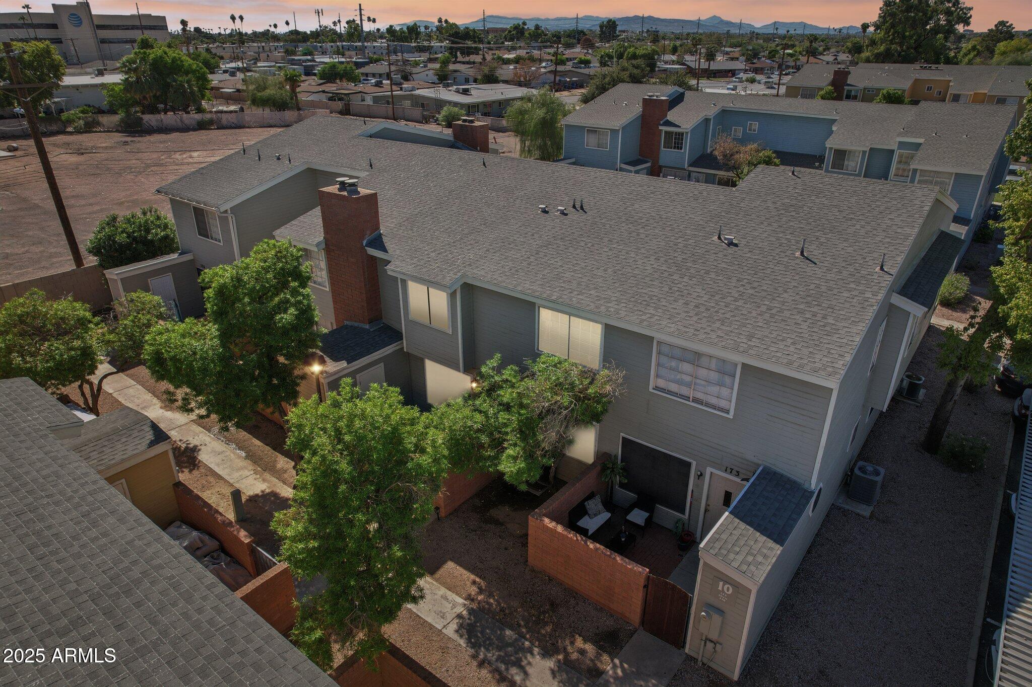 510 North Alma School Road, Unit 174 Mesa, AZ 85201 - Photo 37 of 38 an aerial view of a house with a yard