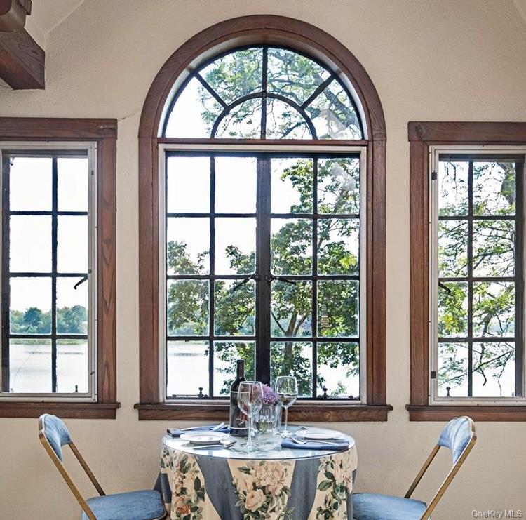 6 Shore Drive Great Neck, NY 11021 - Photo 6 of 10 Dining area with a textured wall