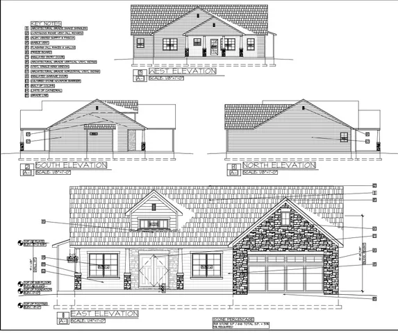 a large kitchen with stainless steel appliances a large counter top a refrigerator and a sink