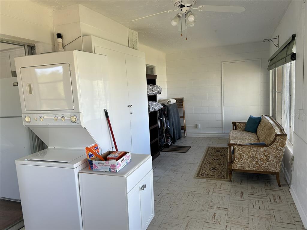4154 57th Street North, Unit 274 Kenneth City, FL 33709 - Photo 17 of 28 a view of a room with gym equipment