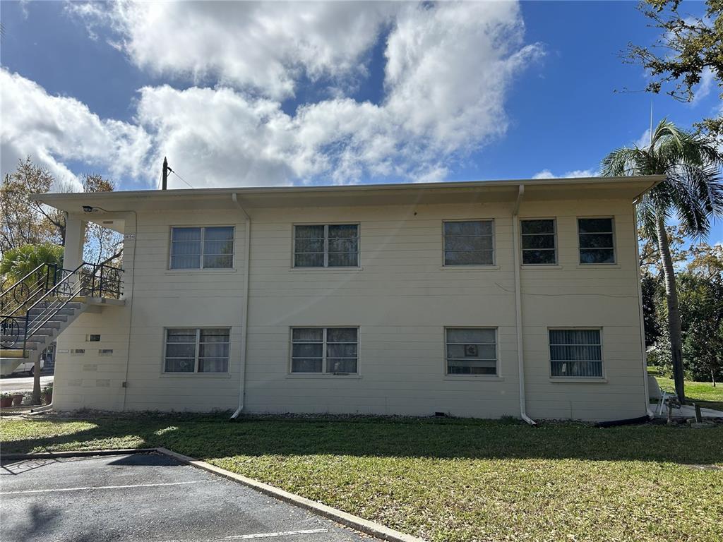 4154 57th Street North, Unit 274 Kenneth City, FL 33709 - Photo 23 of 28 a front view of a house