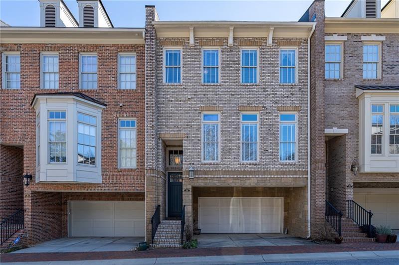 12 Candler Grove Drive Decatur, GA 30030 - Photo 1 of 33 a front view of a building with glass windows