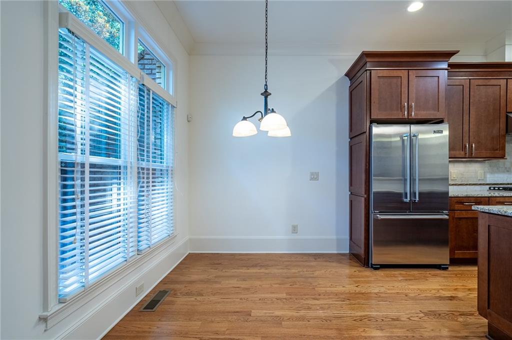 12 Candler Grove Drive Decatur, GA 30030 - Photo 12 of 33 a view of a kitchen with a sink dishwasher and a refrigerator