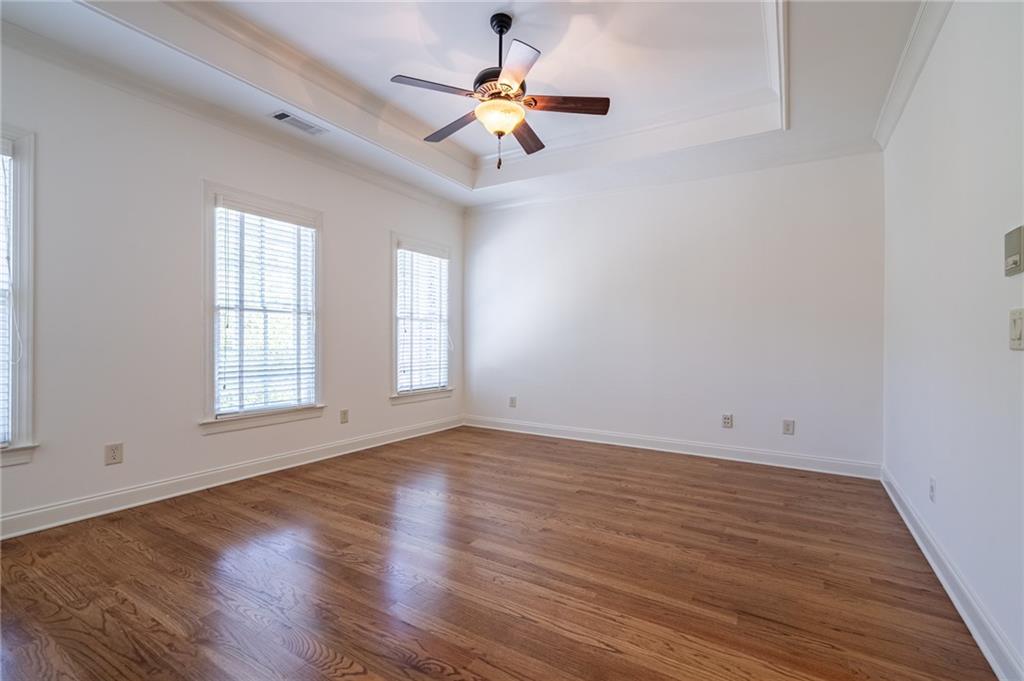 12 Candler Grove Drive Decatur, GA 30030 - Photo 18 of 33 a view of an empty room with window and wooden floor
