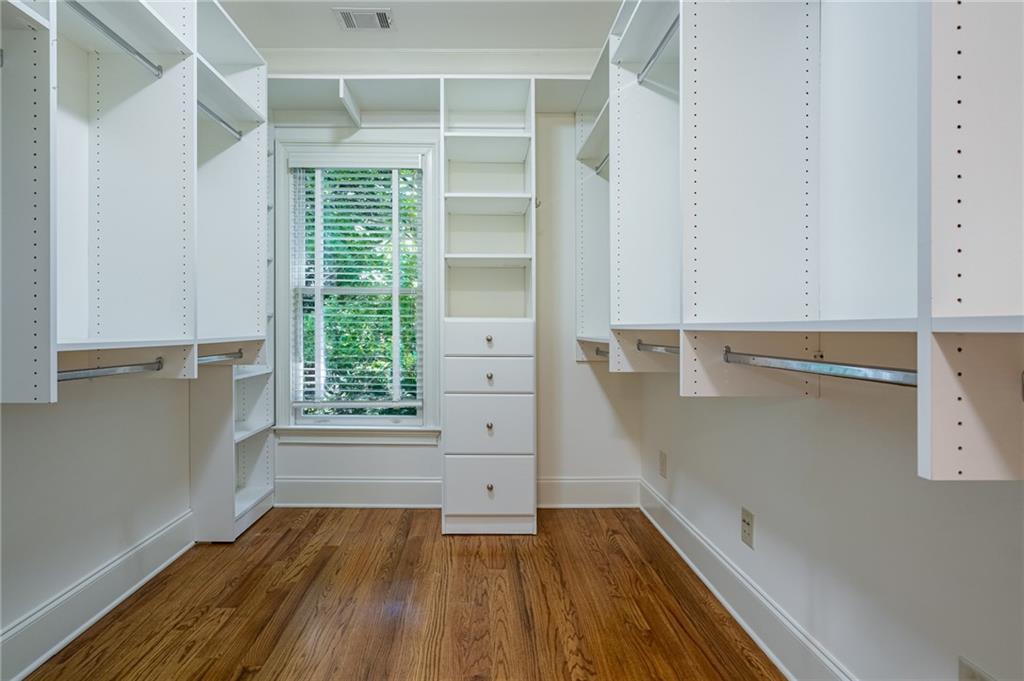 12 Candler Grove Drive Decatur, GA 30030 - Photo 27 of 33 a view of a hallway with wooden floors and a window