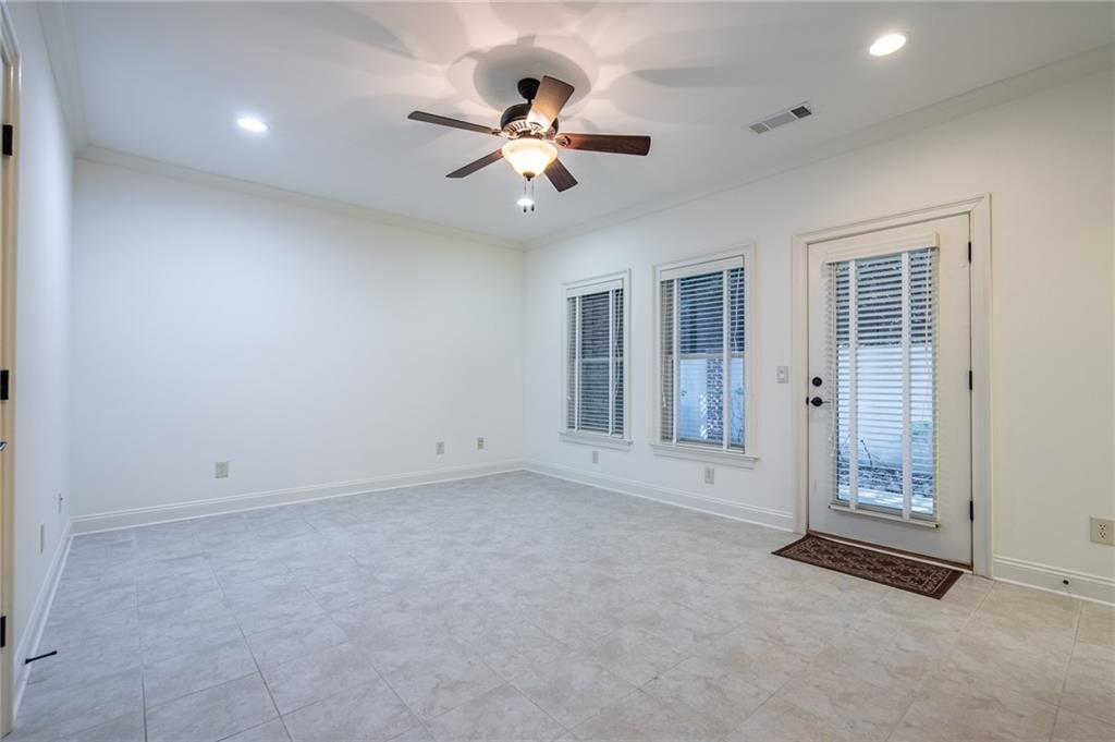 12 Candler Grove Drive Decatur, GA 30030 - Photo 30 of 33 an empty room with chandelier fan