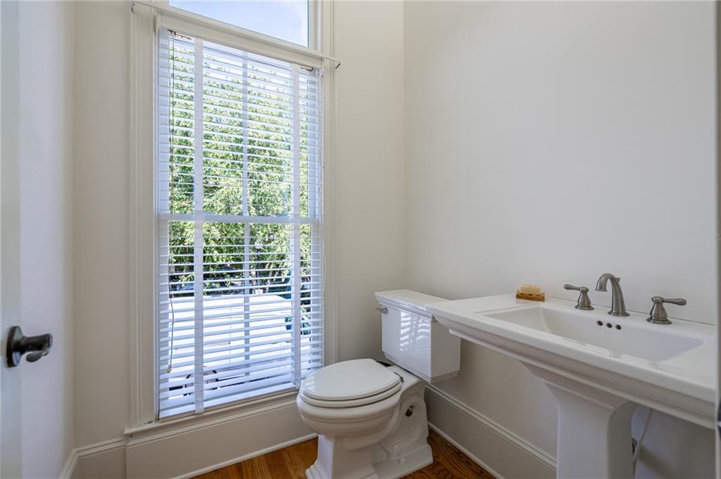 12 Candler Grove Drive Decatur, GA 30030 - Photo 8 of 33 a white toilet sitting next to a bathroom sink