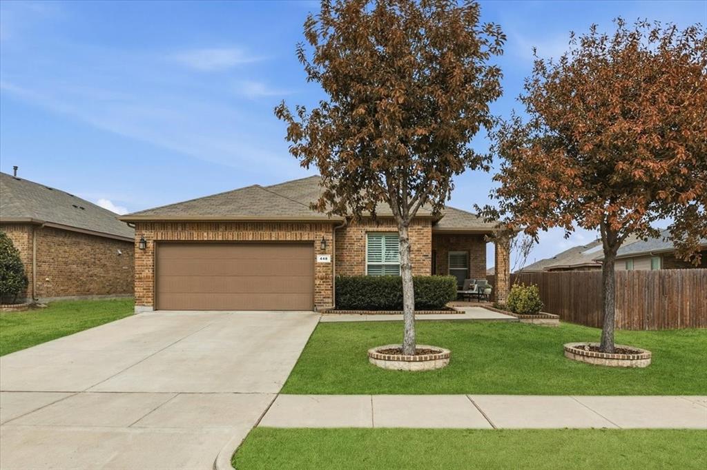 448 Spring Drive Saginaw, TX 76131 - Photo 2 of 40 a front view of house with yard and green space