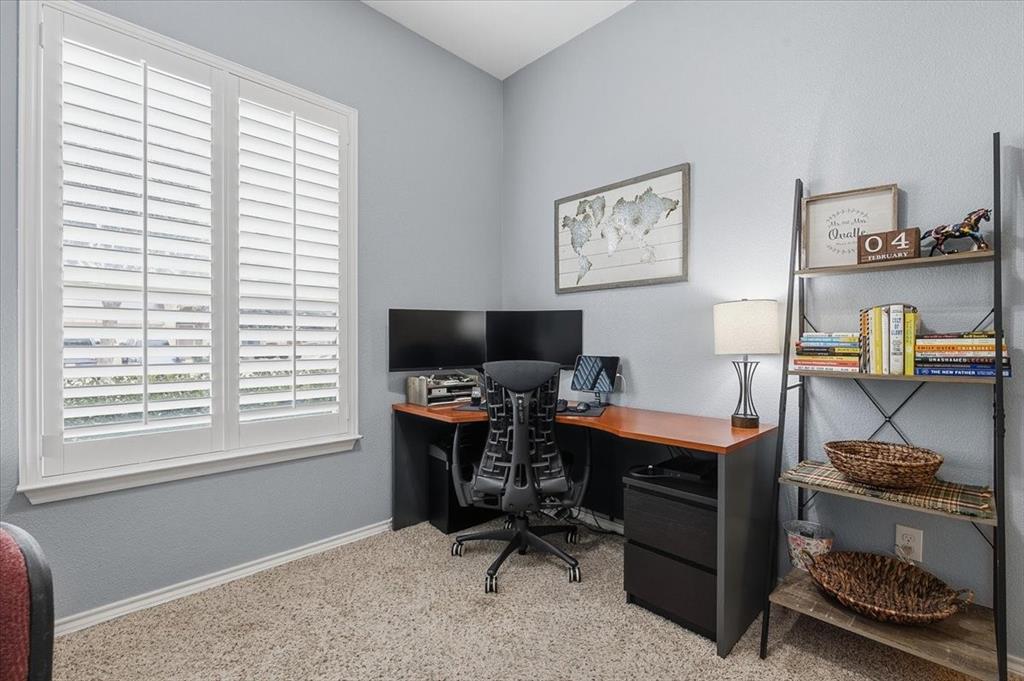 448 Spring Drive Saginaw, TX 76131 - Photo 34 of 40 a view of a workspace with a window and workspace