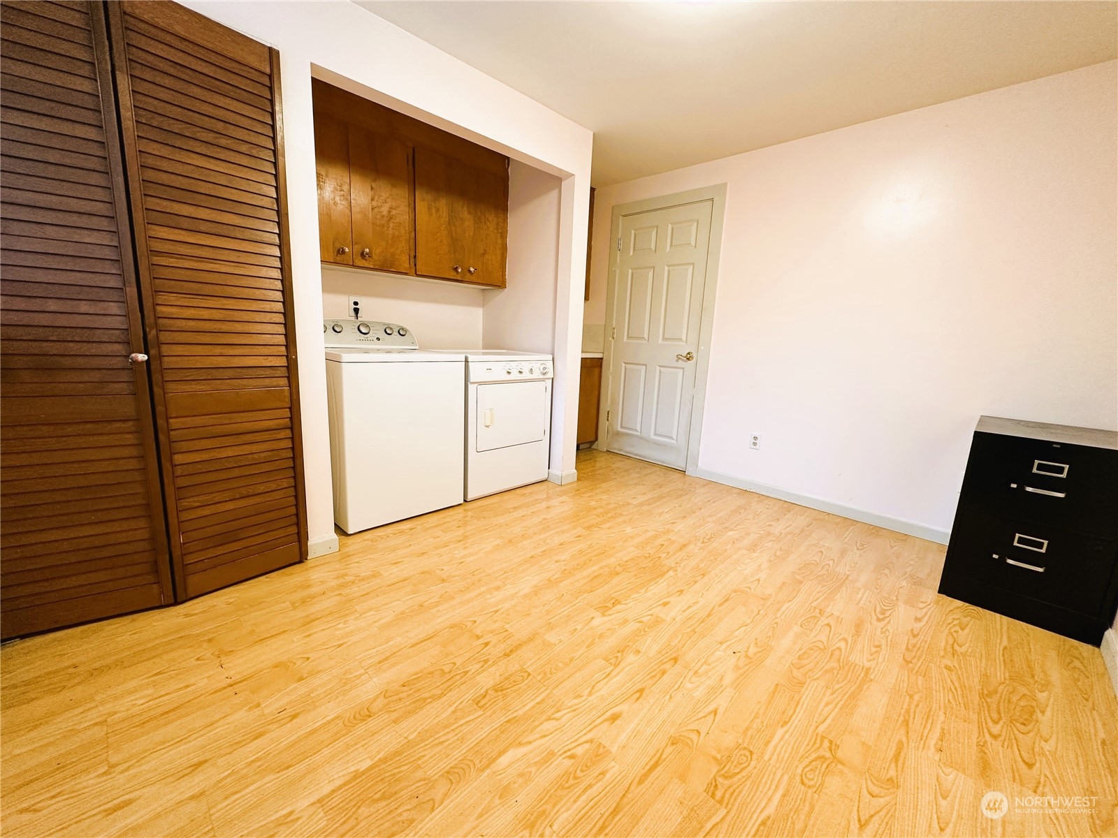 12429 Southeast 95th Way Renton, WA 98056 - Photo 11 of 15 a view of a room with storage and utility room
