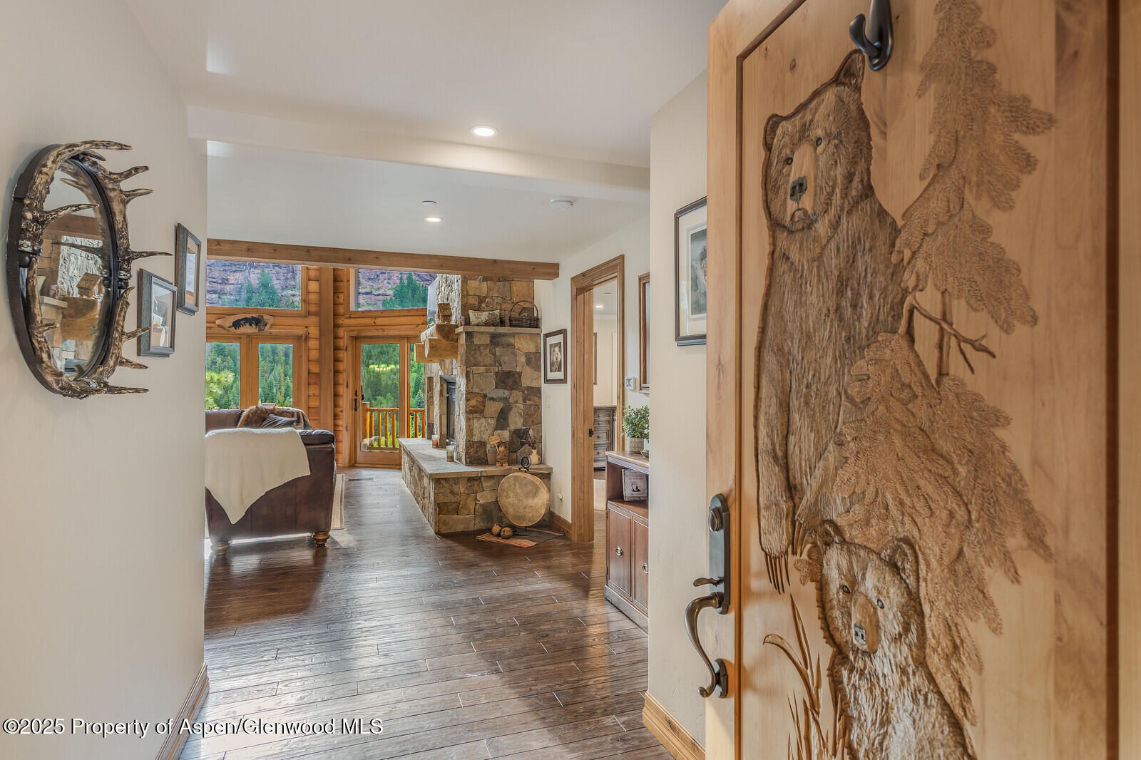 175 Bison Lane Redstone, CO 81623 - Photo 14 of 60 a living room with furniture and a floor to ceiling window