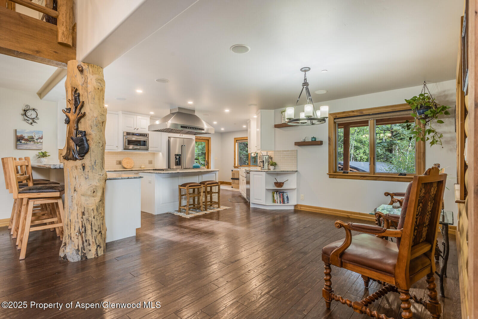 175 Bison Lane Redstone, CO 81623 - Photo 24 of 60 a living room with furniture and a chandelier