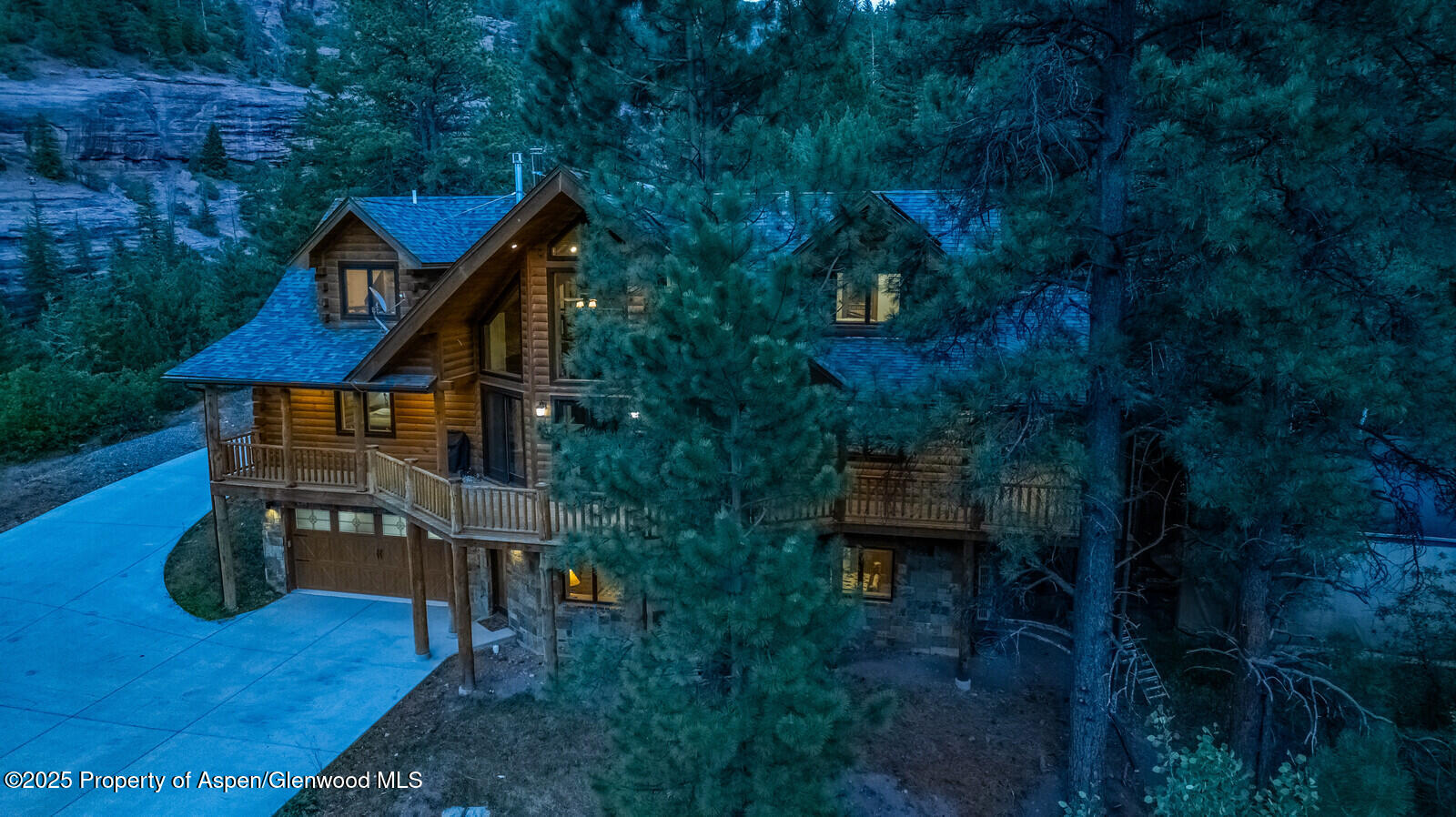 175 Bison Lane Redstone, CO 81623 - Photo 3 of 60 a view of house with backyard and outdoor seating