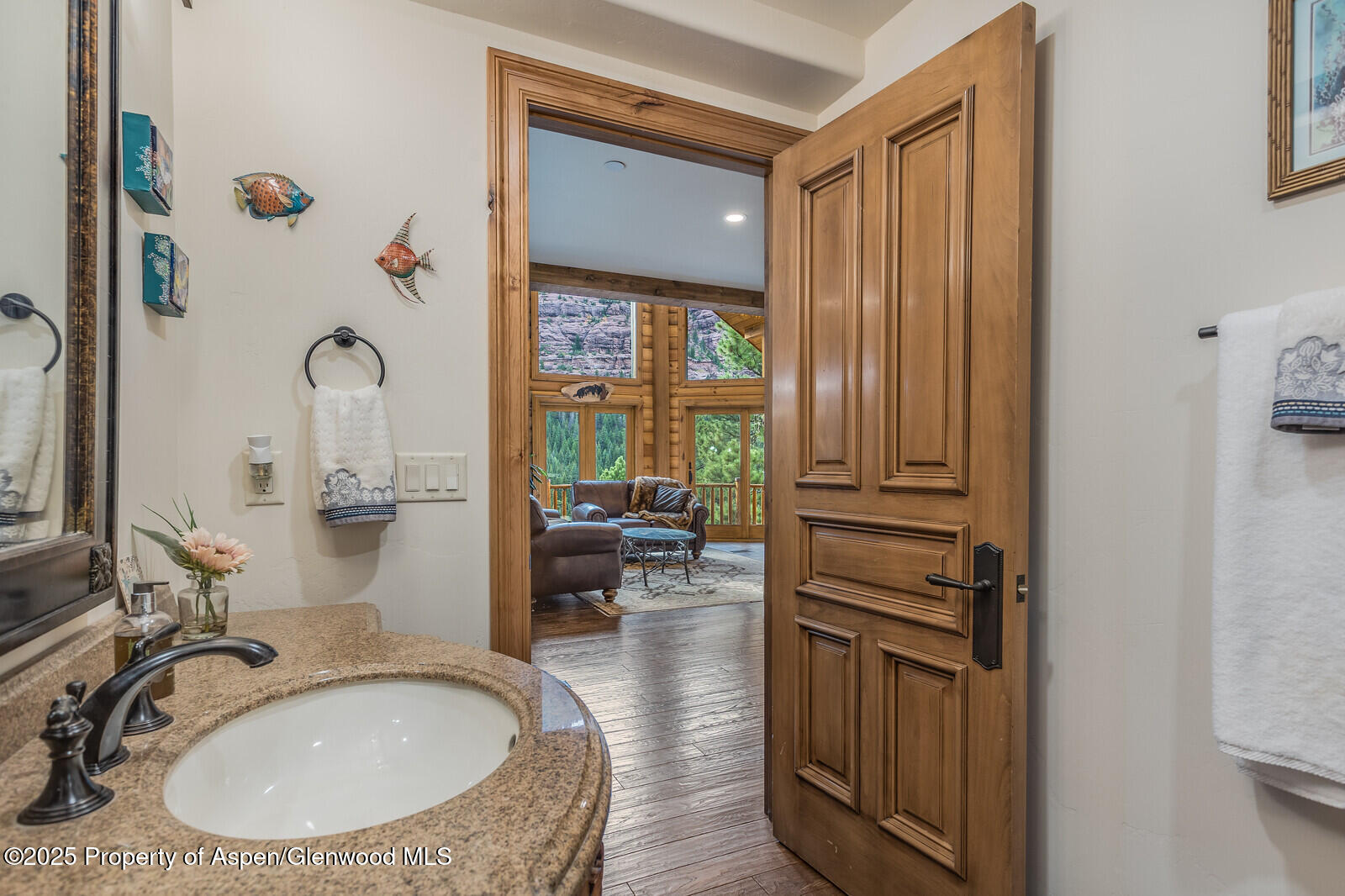 175 Bison Lane Redstone, CO 81623 - Photo 31 of 60 a bathroom with a sink and a mirror