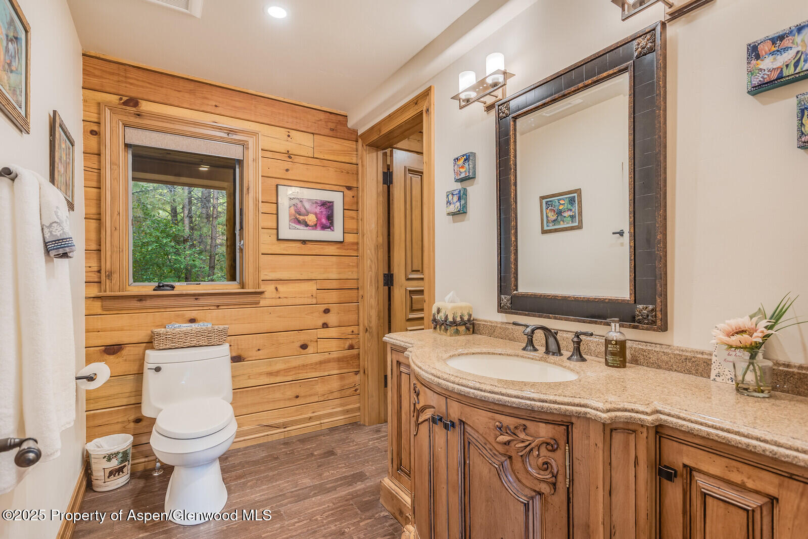 175 Bison Lane Redstone, CO 81623 - Photo 32 of 60 a bathroom with a sink a toilet and a mirror