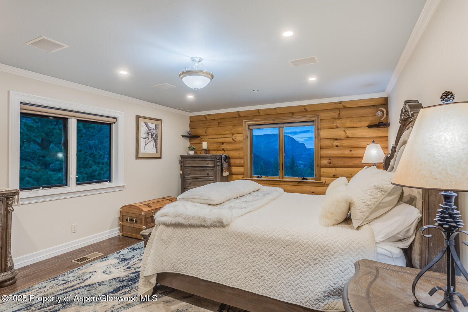 175 Bison Lane Redstone, CO 81623 - Photo 34 of 60 a bedroom with a large bed and a dresser