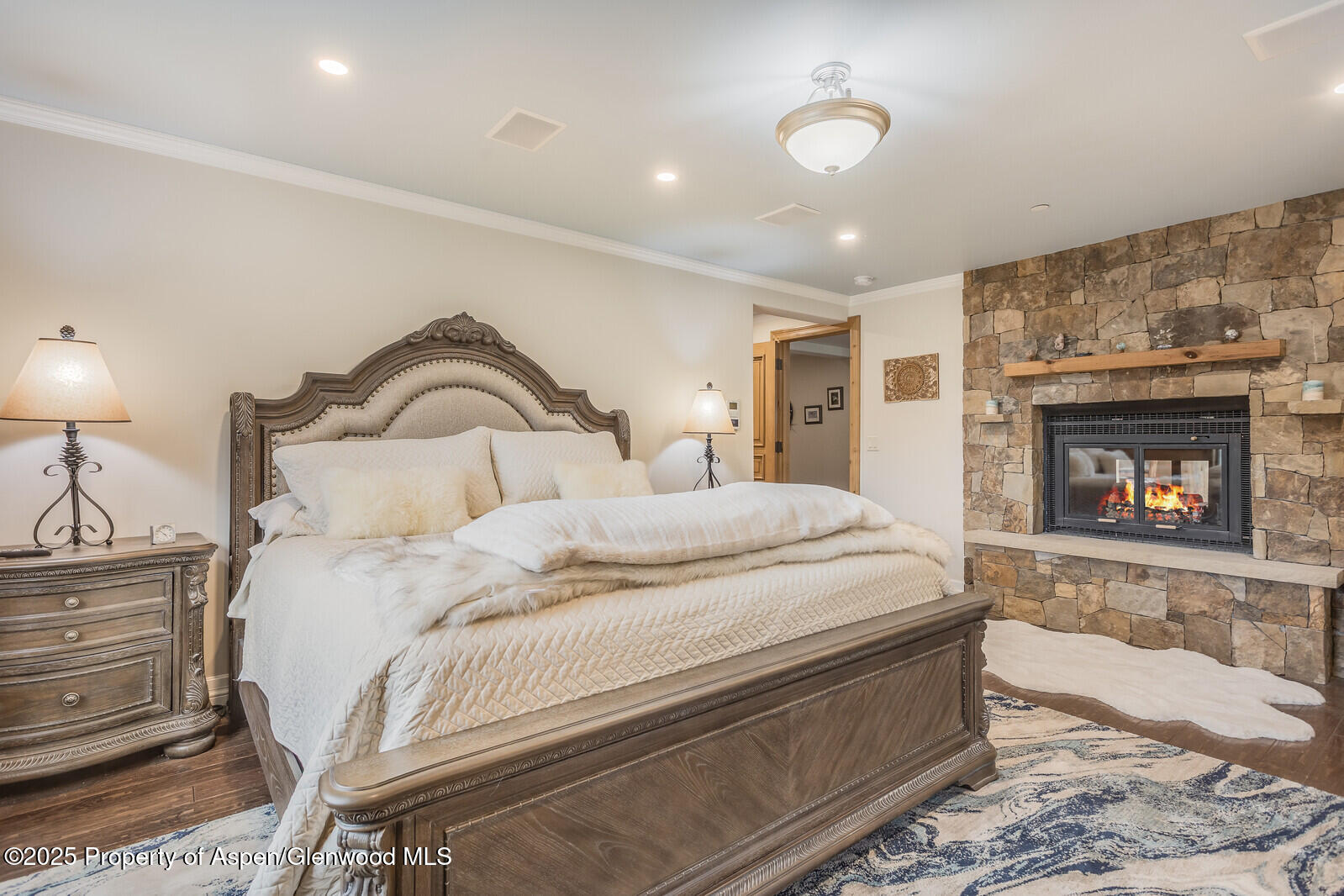 175 Bison Lane Redstone, CO 81623 - Photo 36 of 60 a bedroom with a bed and a fireplace