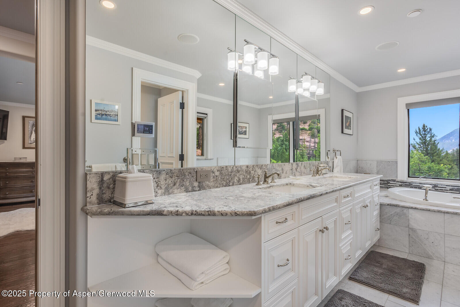 175 Bison Lane Redstone, CO 81623 - Photo 38 of 60 a bathroom with a granite countertop double vanity sink and a mirror