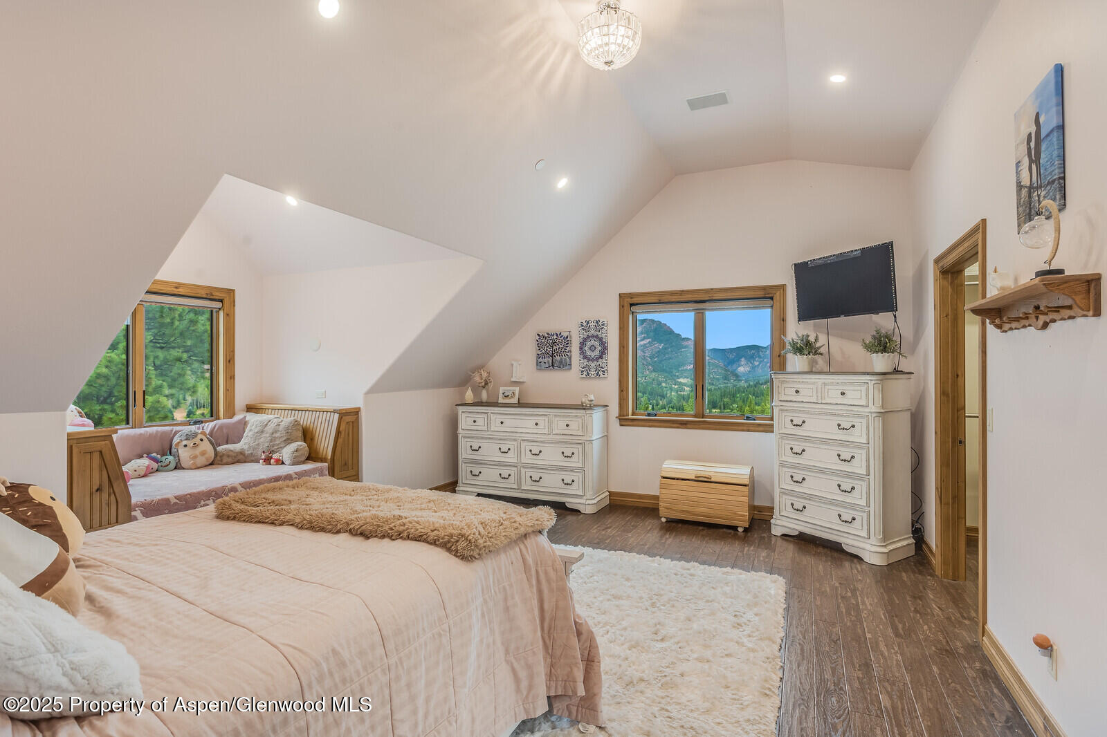 175 Bison Lane Redstone, CO 81623 - Photo 42 of 60 a bedroom with furniture and a large window