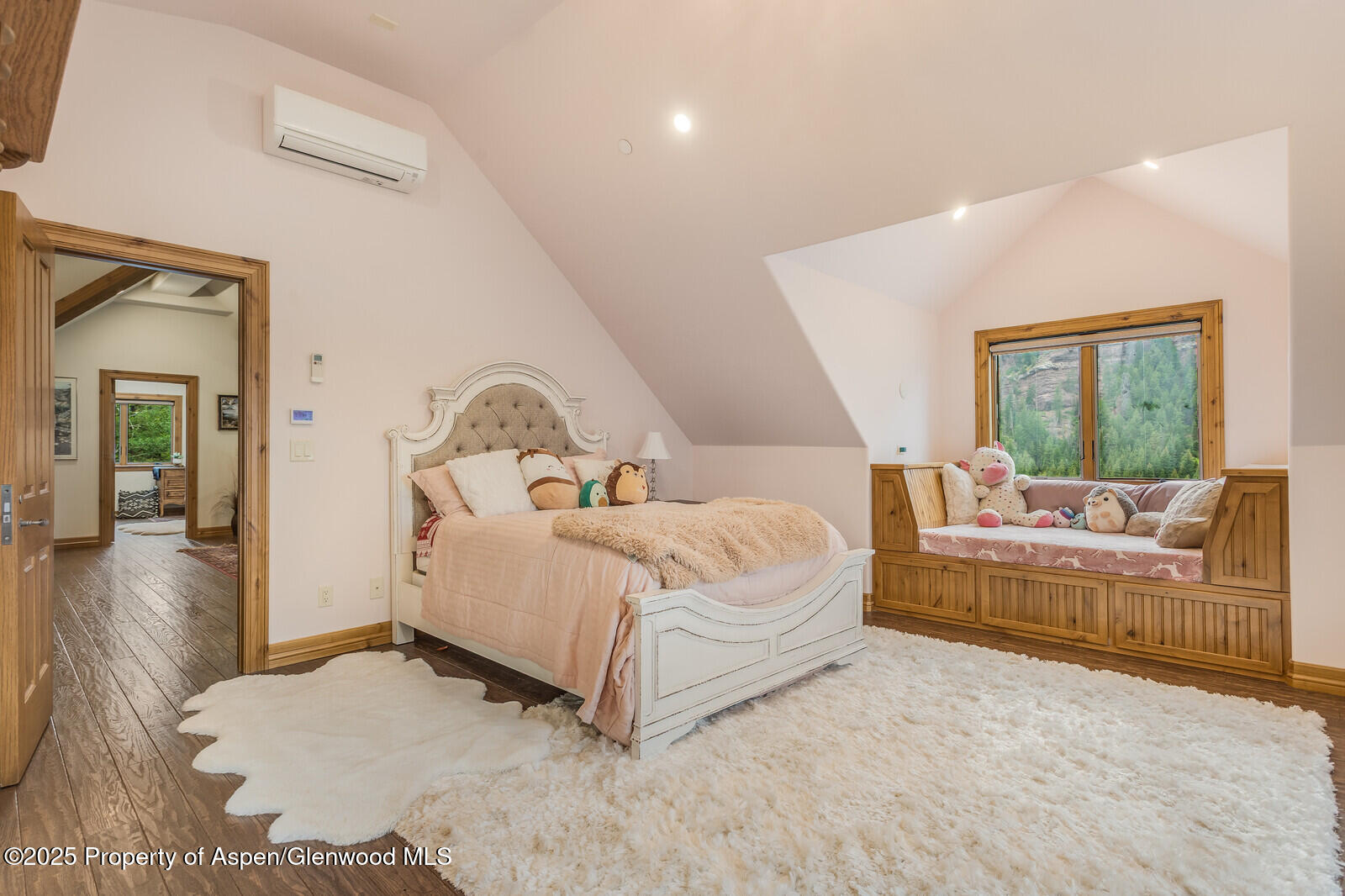 175 Bison Lane Redstone, CO 81623 - Photo 44 of 60 a bed room with a bed and a large window