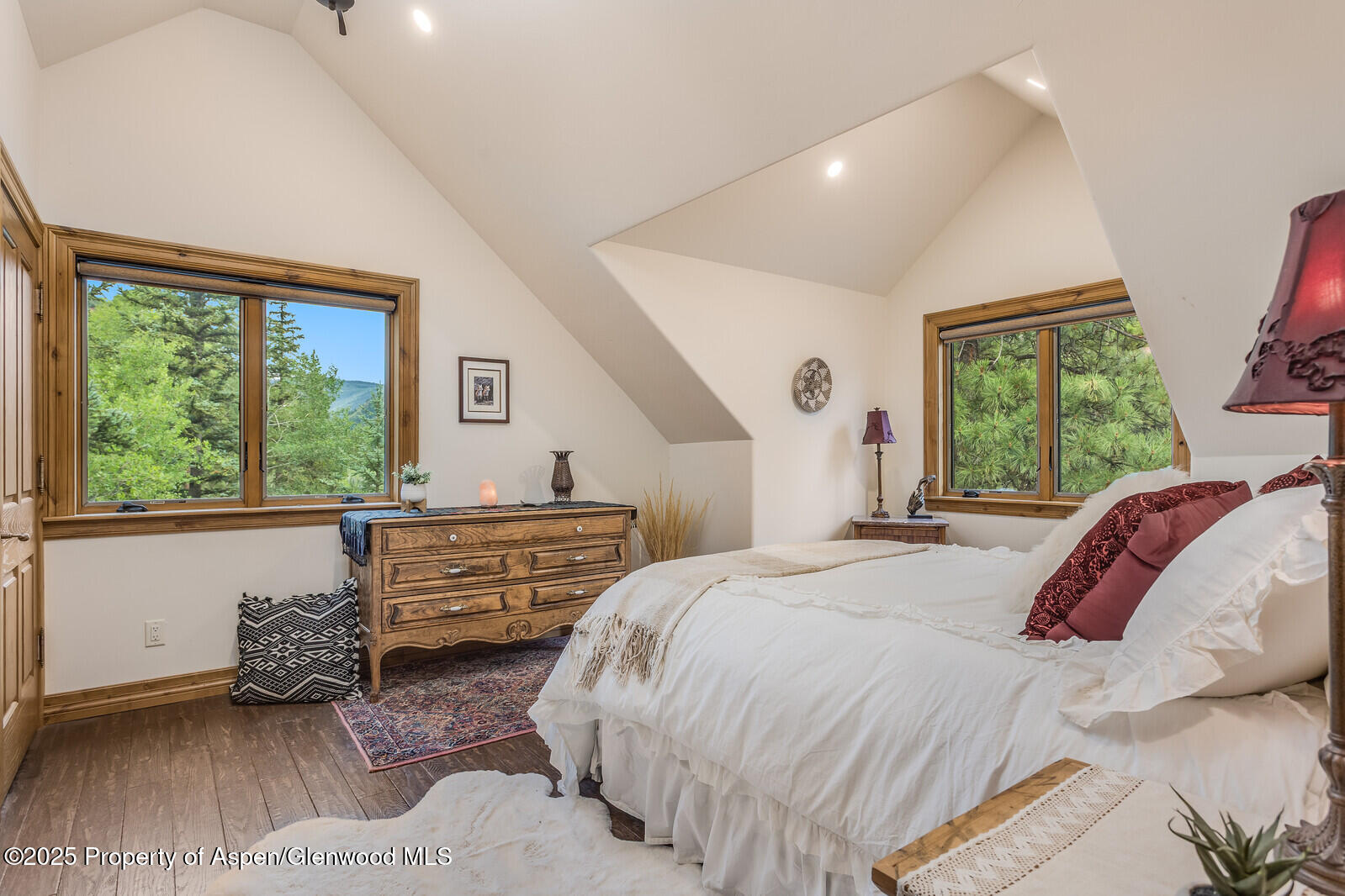 175 Bison Lane Redstone, CO 81623 - Photo 46 of 60 a bedroom with a bed and a large window