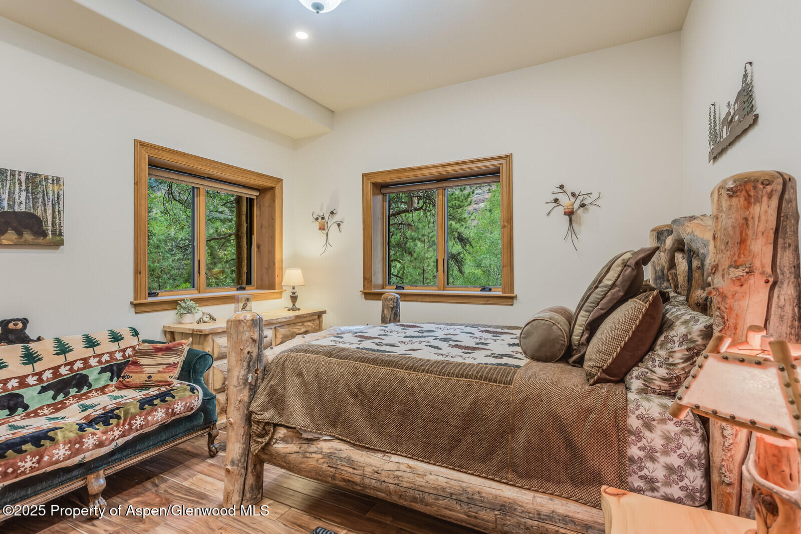 175 Bison Lane Redstone, CO 81623 - Photo 56 of 60 a bed sitting in a bedroom next to a window