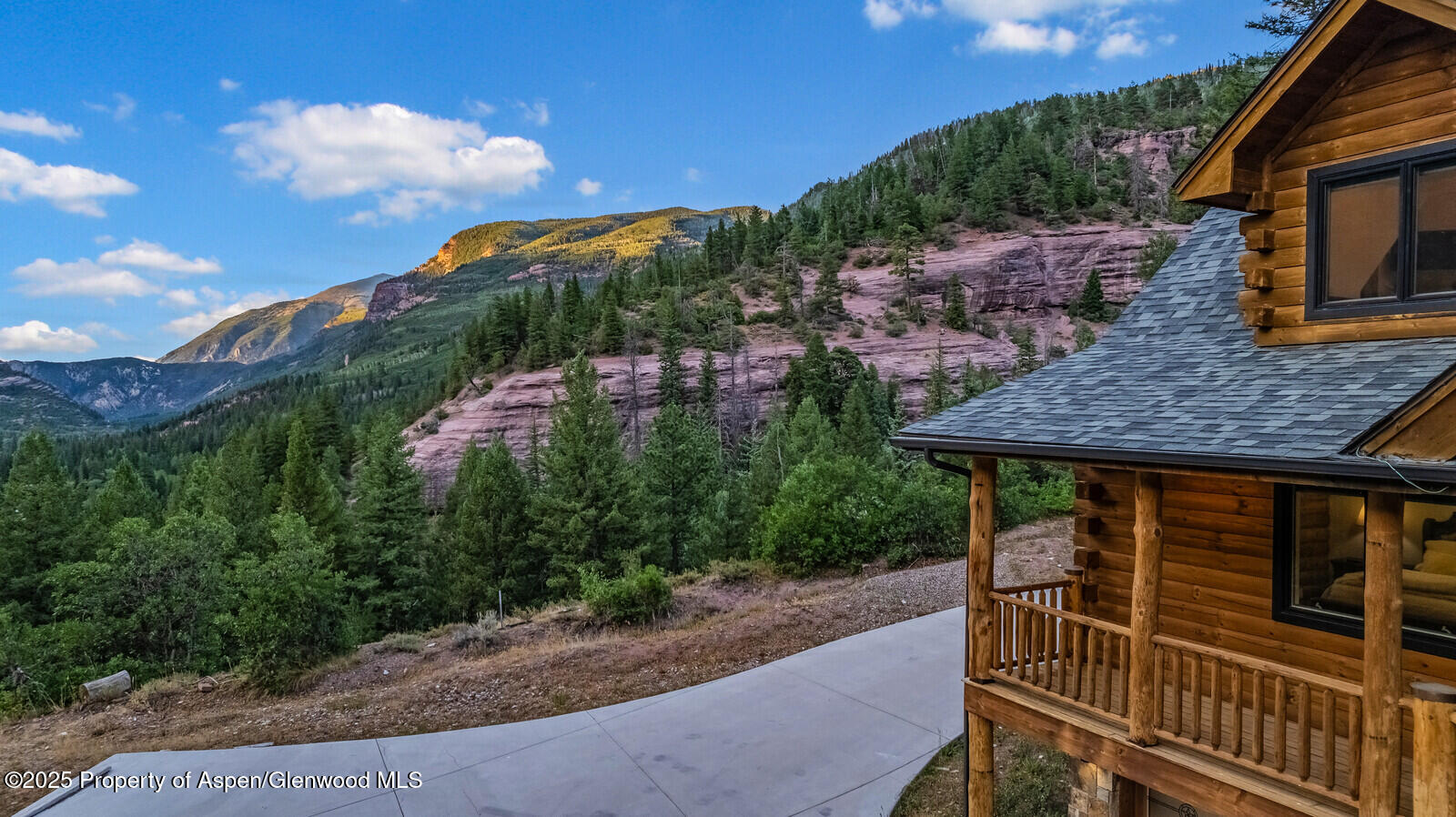 175 Bison Lane Redstone, CO 81623 - Photo 8 of 60 a view of a house with a yard