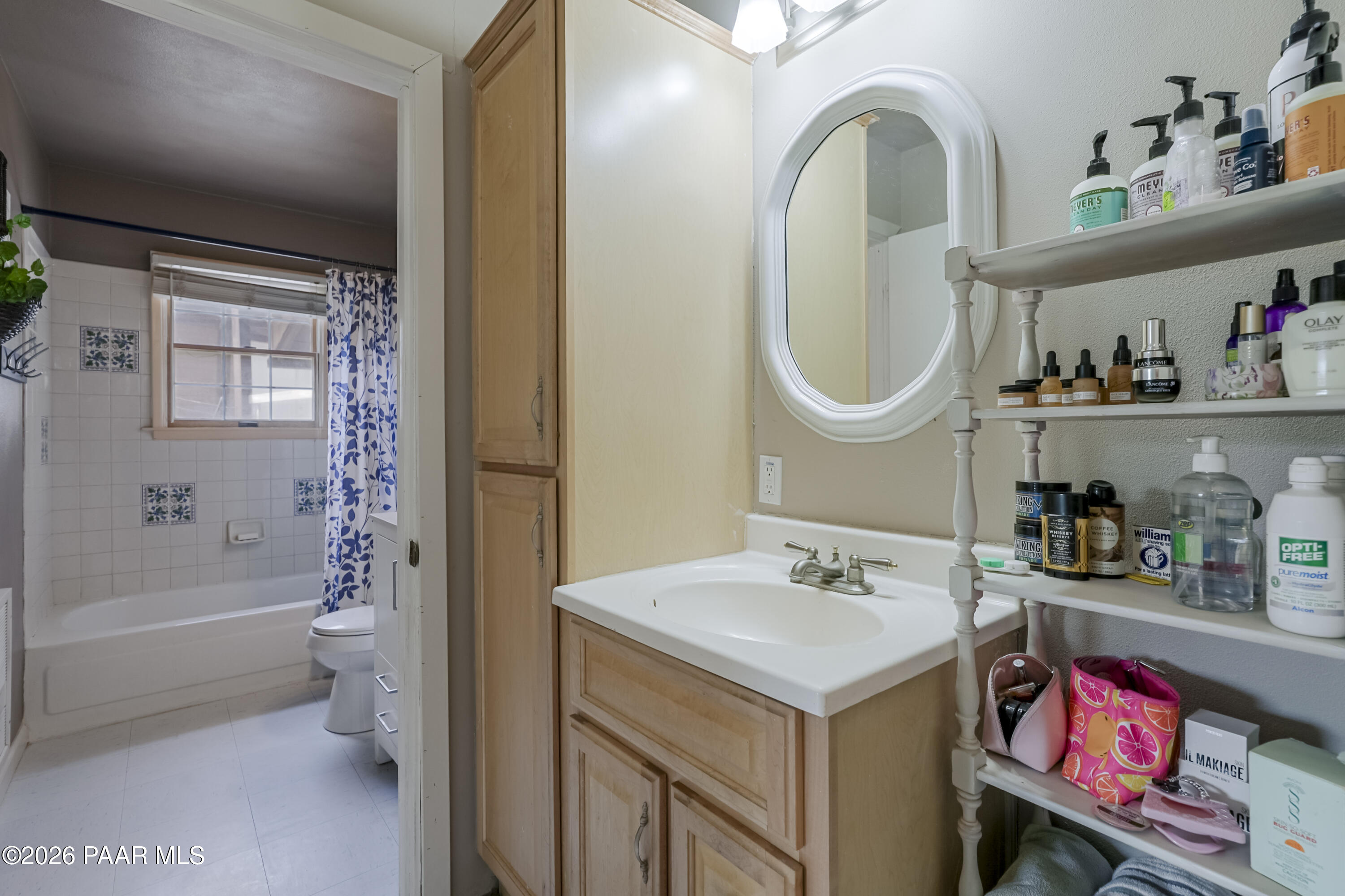 22584 Stone Way Yarnell, AZ 85362 - Photo 20 of 36 a bathroom with a sink a toilet and a shower