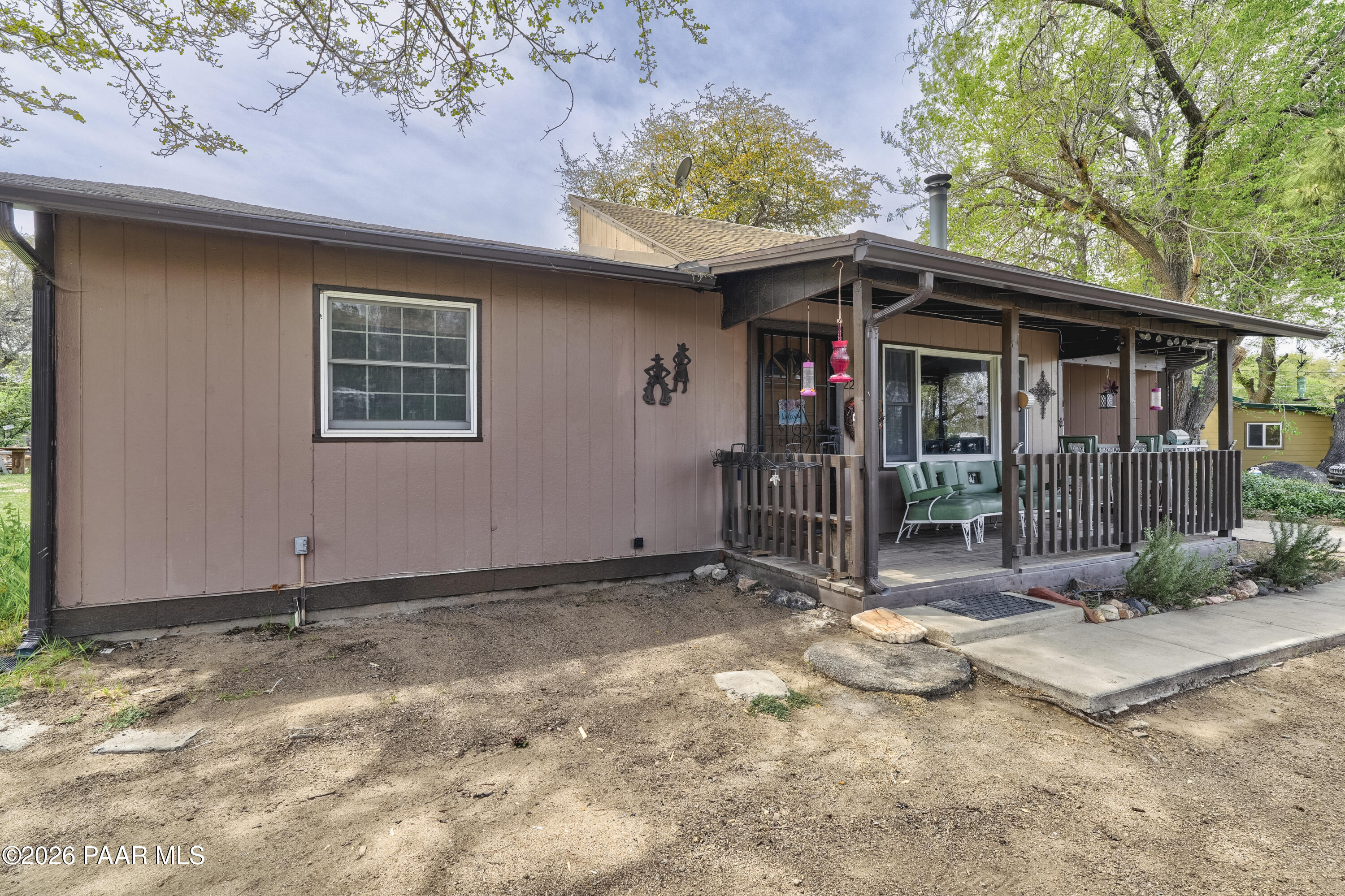 22584 Stone Way Yarnell, AZ 85362 - Photo 3 of 36 a view of a house with a porch and a yard