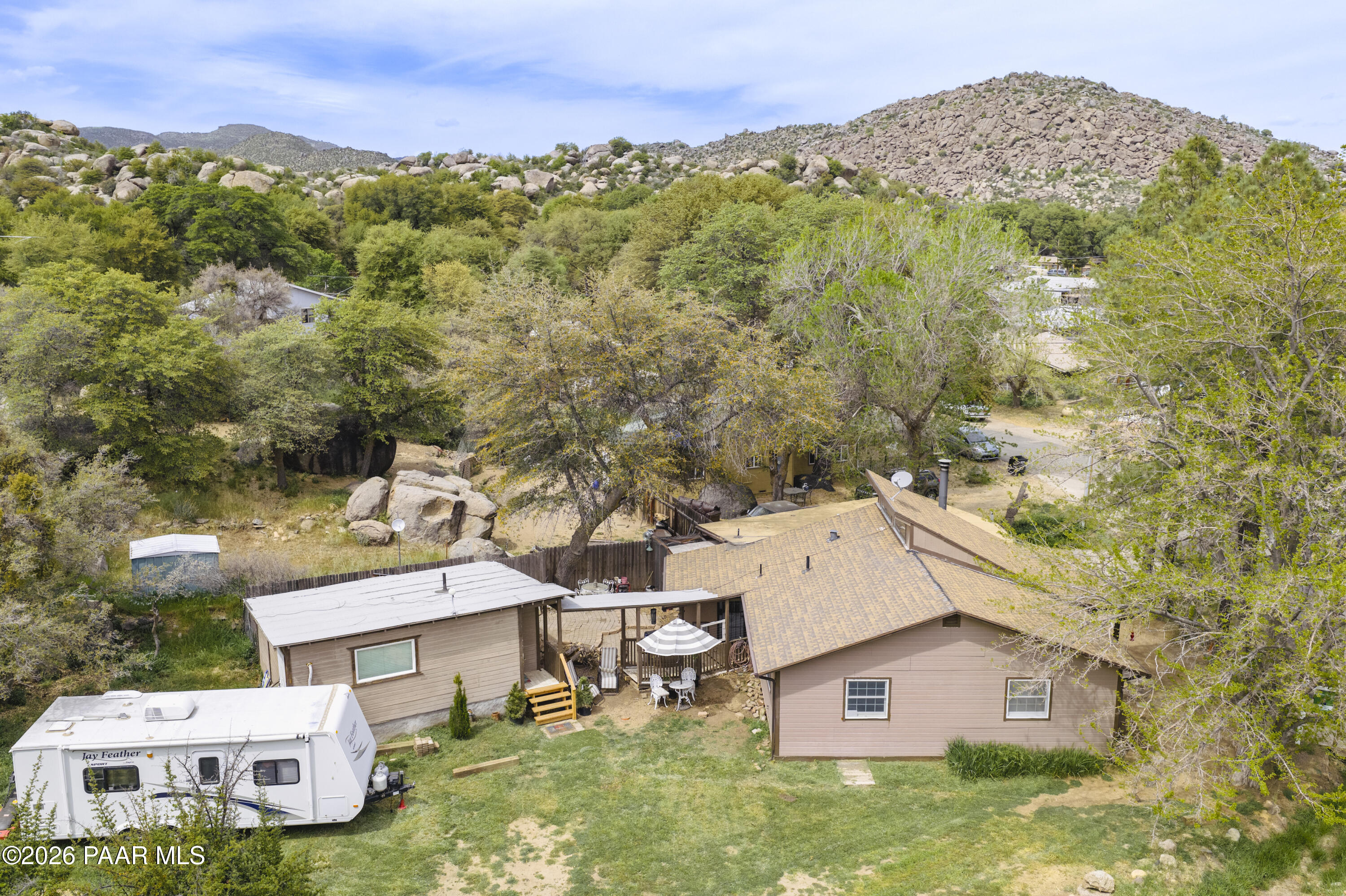 22584 Stone Way Yarnell, AZ 85362 - Photo 34 of 36 an aerial view of residential houses with outdoor space and trees