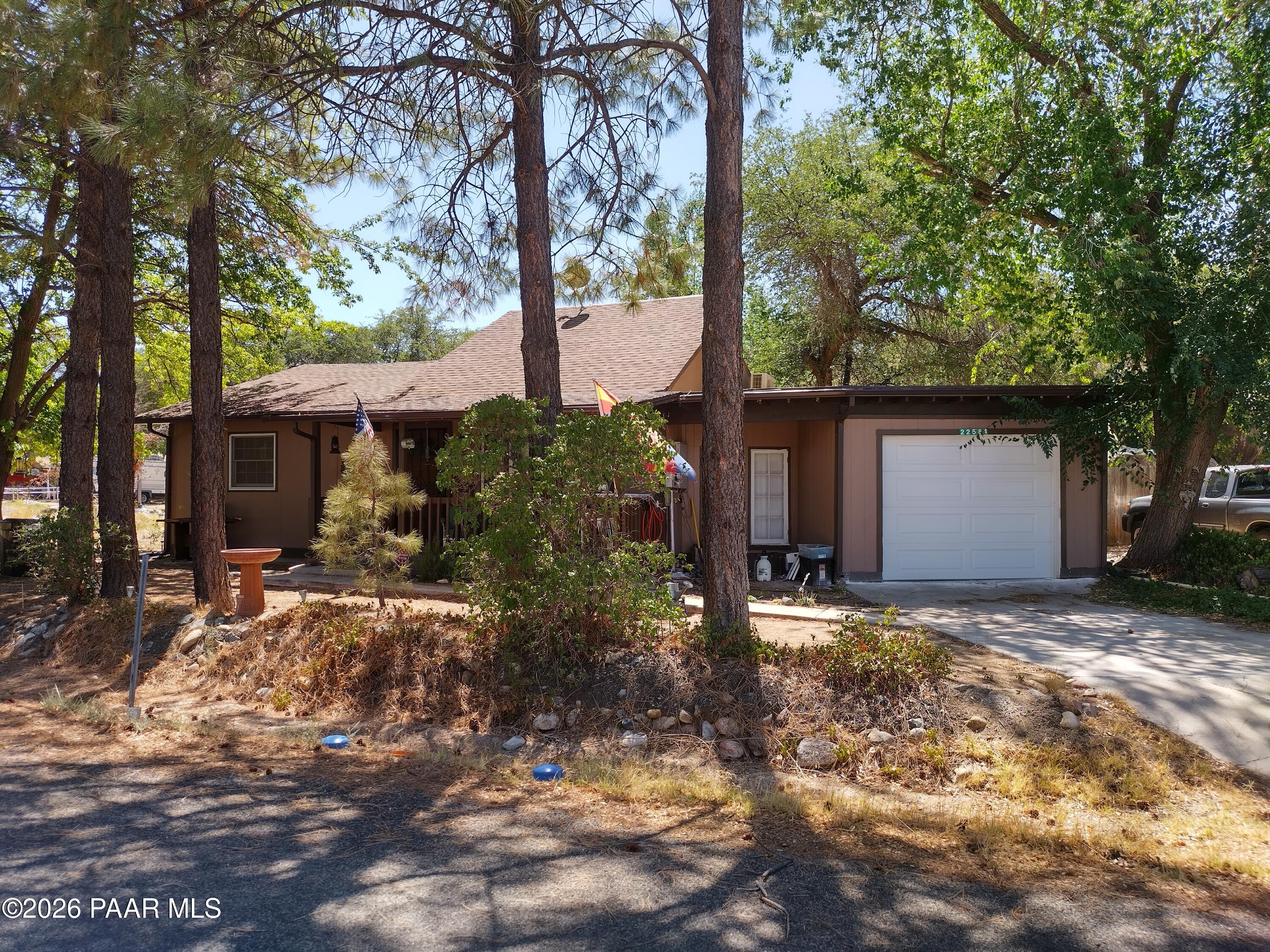 22584 Stone Way Yarnell, AZ 85362 - Photo 4 of 36 a view of a house with a tree in front of it