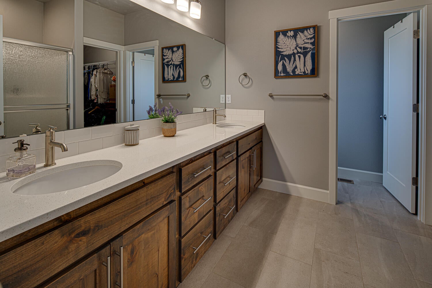 4741 Southwest Zenith Avenue Redmond, OR 97756 - Photo 13 of 34 Primary bath offers double vanities & tons of storage.