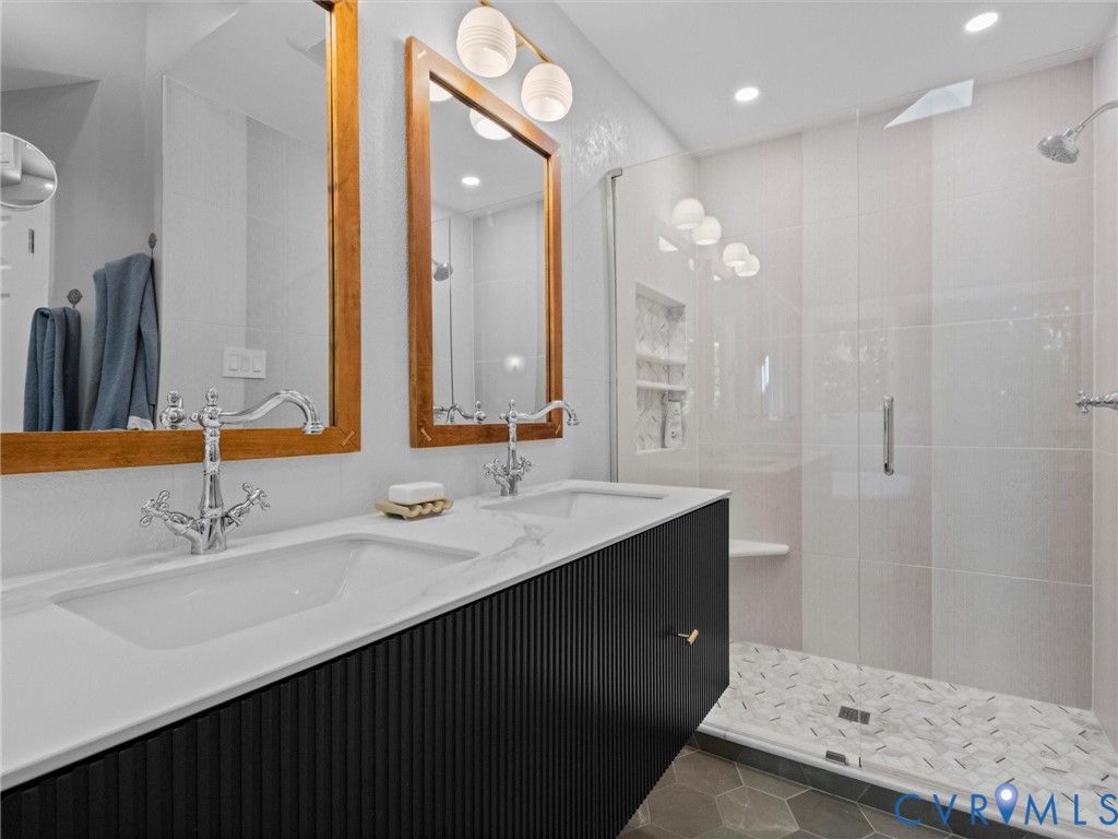 3201 St Stephens Way Midlothian, VA 23113 - Photo 19 of 72 a bathroom with a double vanity sink a mirror and a