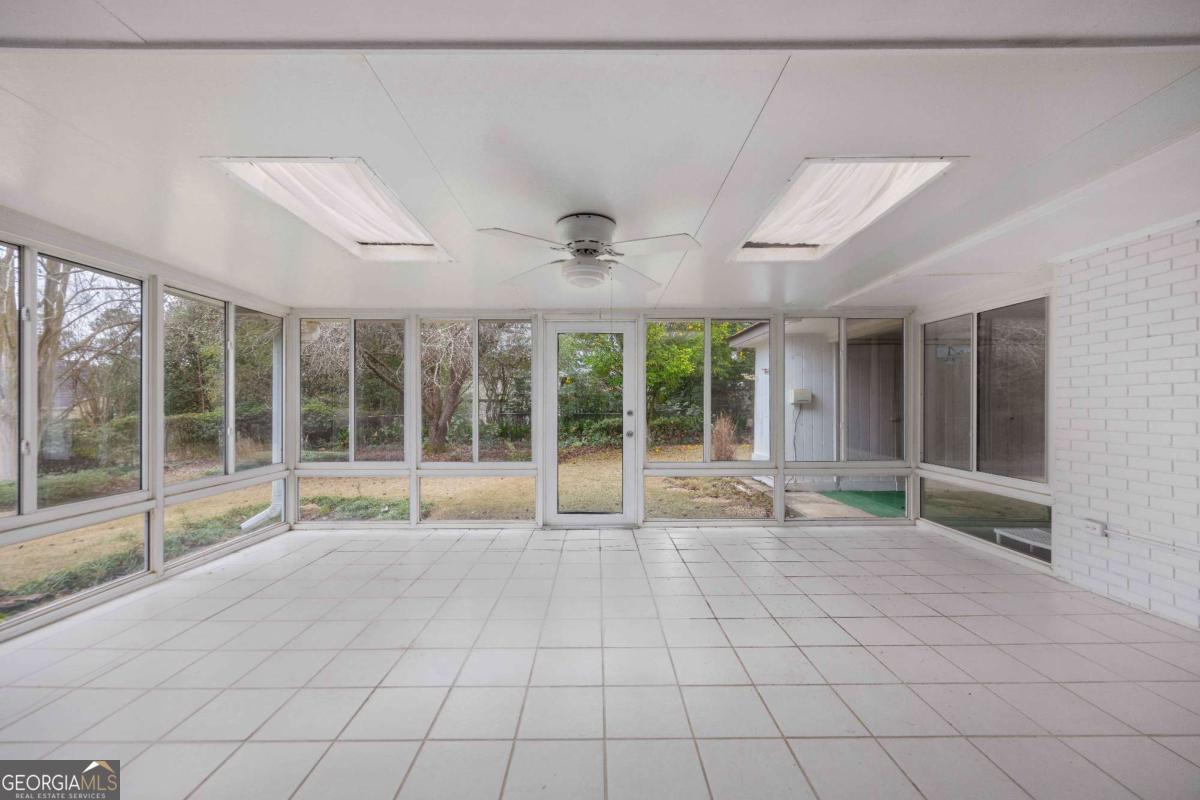2836 Cromwell Drive Columbus, GA 31906 - Photo 19 of 34 a view of an empty room with a balcony