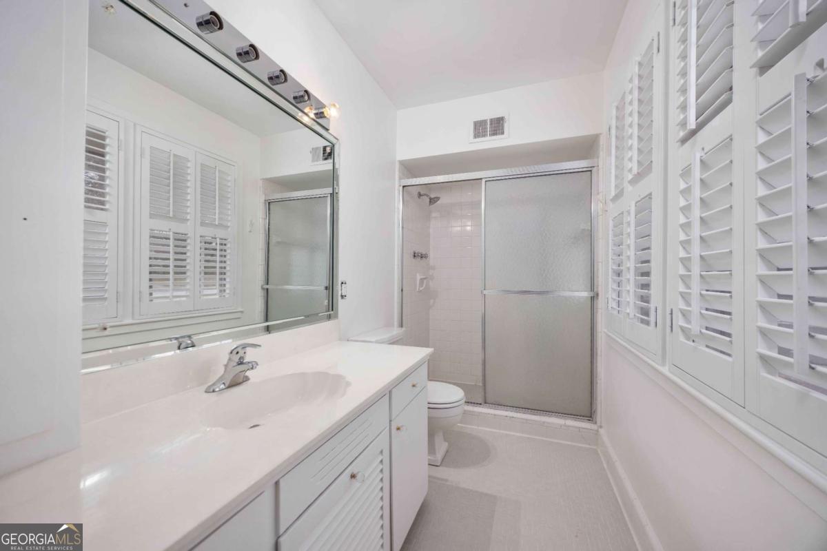 2836 Cromwell Drive Columbus, GA 31906 - Photo 20 of 34 a bathroom with a sink a toilet and shower