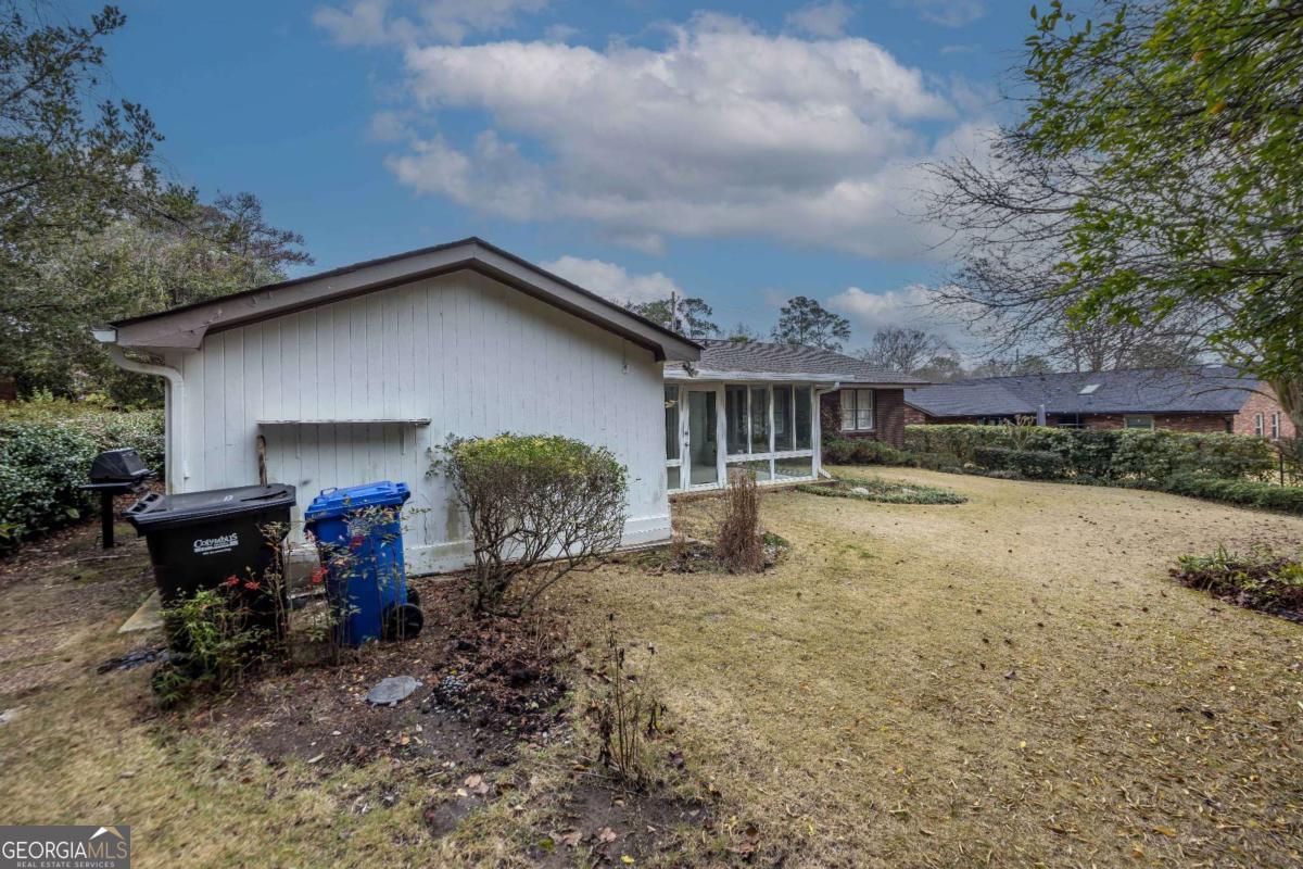 2836 Cromwell Drive Columbus, GA 31906 - Photo 29 of 34 a view of a house with a yard and sitting area