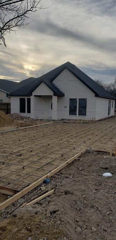 3422 Peachtree Road Balch Springs, TX 75180 - Photo 2 of 17 a house with a white roof