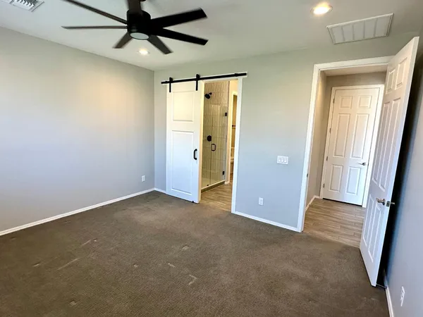 a bathroom with double vanity sink and mirror