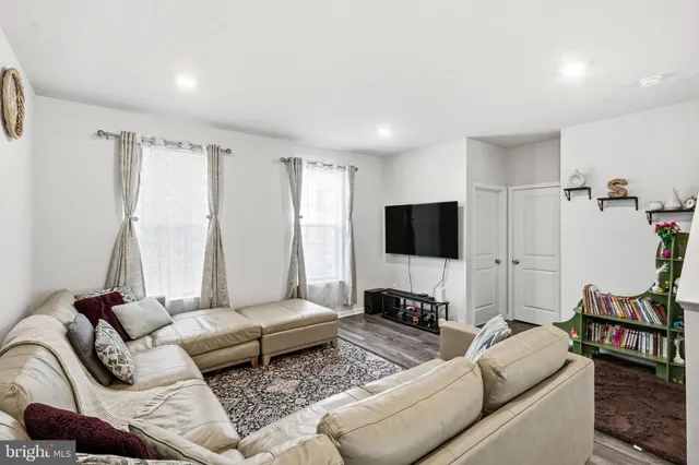 a living room with furniture and a couch