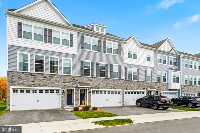 a front view of a building with a glass door